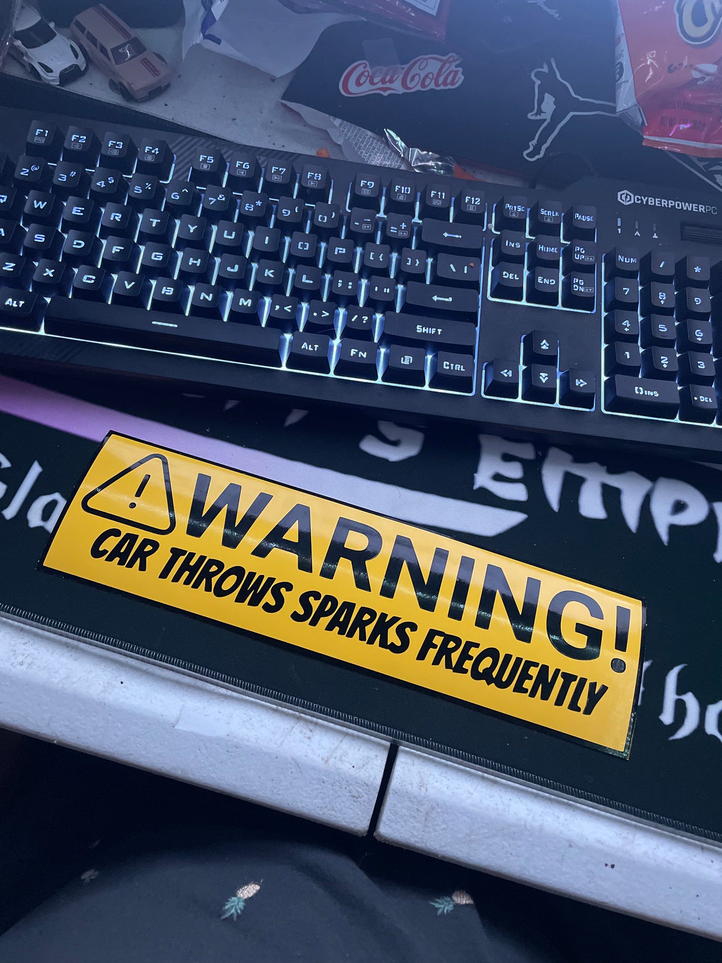 Car throws sparks bumper sticker